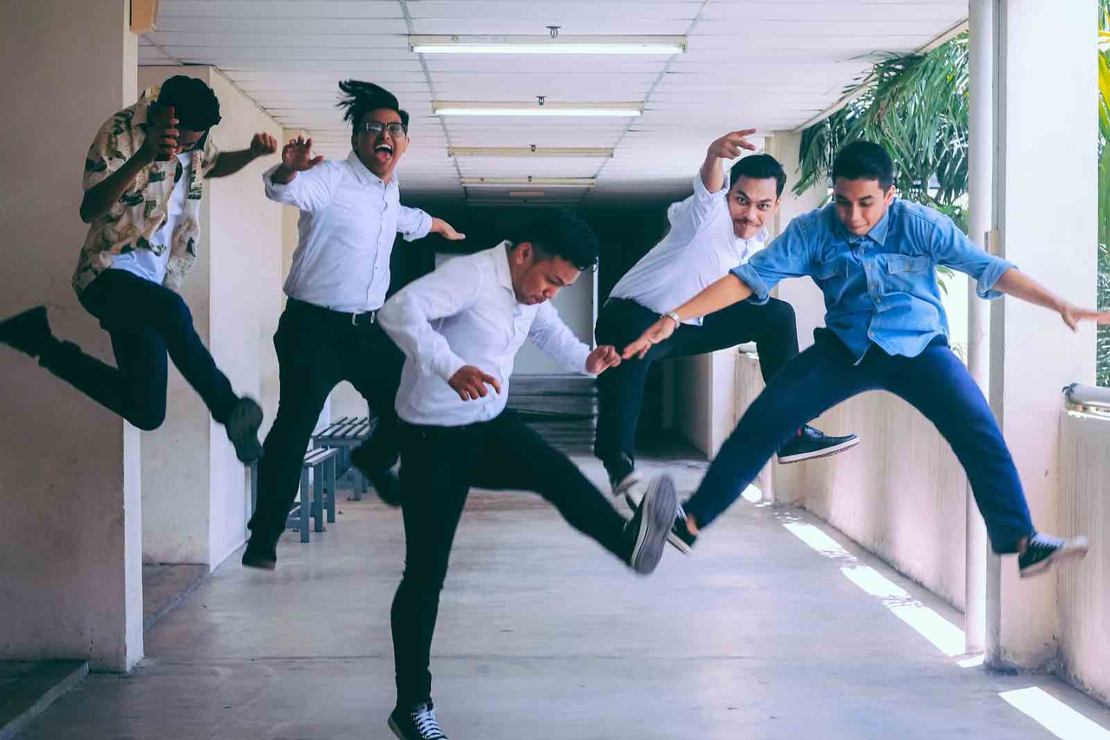 Employees jumping for joy