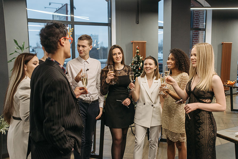 Colleagues making a festive toast at an office party