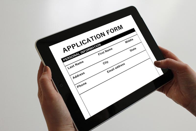 Close up of tablet being used tofill out an online job application form