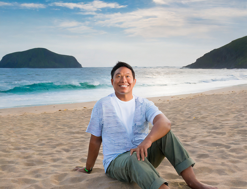 An employee relaxing on a beach during a vacation covered by his employer’s PTO policy.